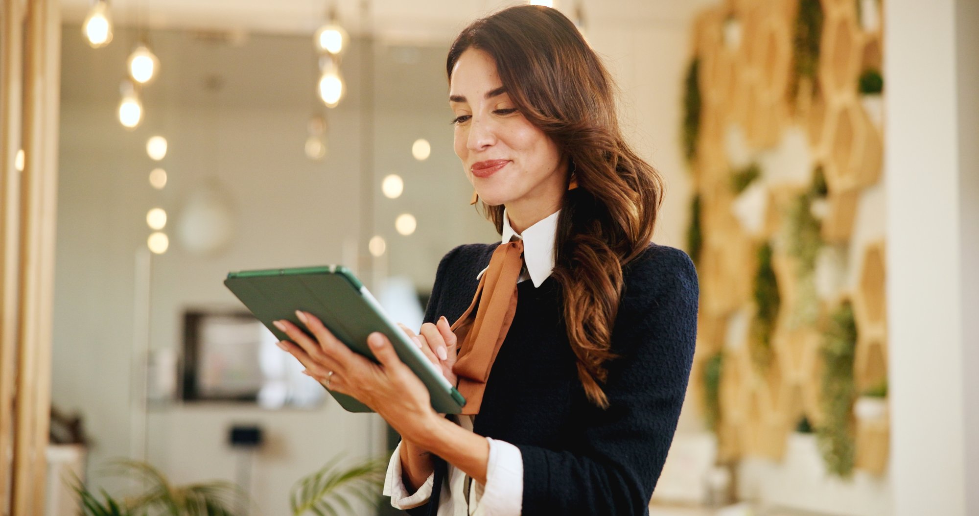 Woman reading on tablet