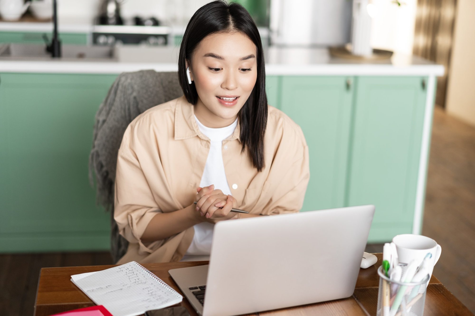 young-corporate-woman-working-from-home-asian-girl-has-online-classes-remotely-talking-video-chat-scaled